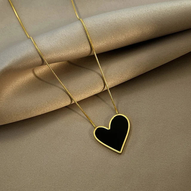 Elegant Black Heart Pendant Necklace with Gold Chain for Women